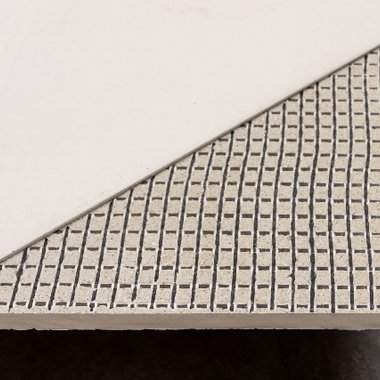 Mit dem entwickelten Bewehrungsgewebe verstärktes Betonbauteil. © ITM/TU Dresden